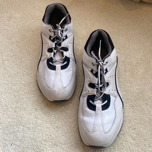 Gold shoes. Foot Joy